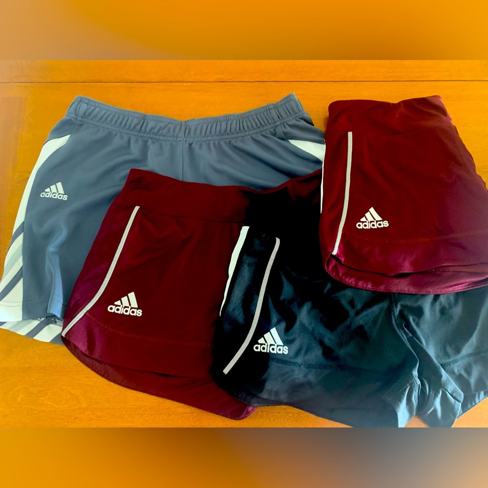 4 Pair of Women’s Adidas Gym Shorts. All Size MEDIUM.